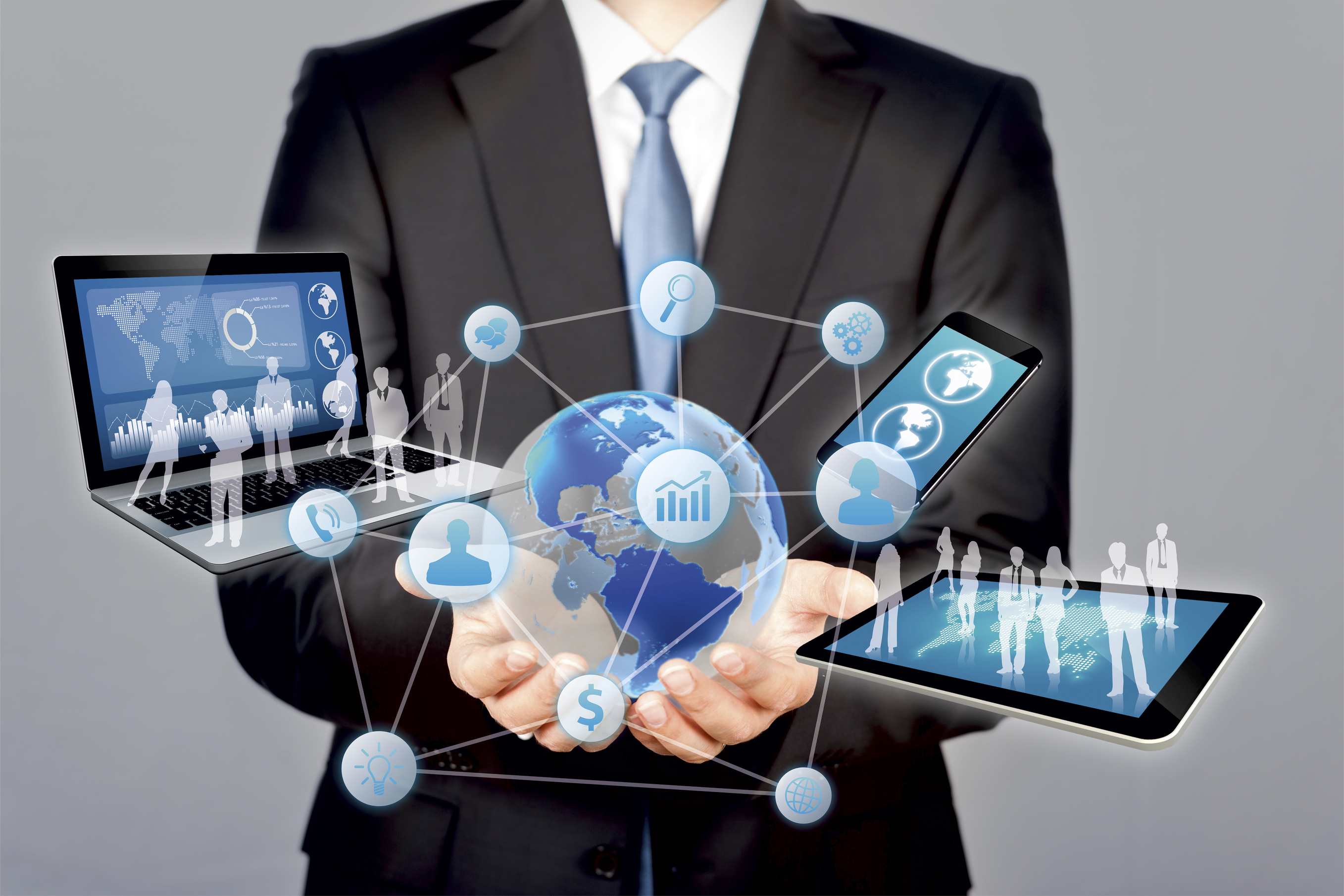 Businessman Holds Modern Technology In Hands Mintcake Digital